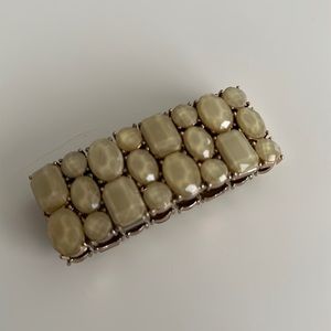 STUNNING statement bracelet with neutral colored stones and gold accents.